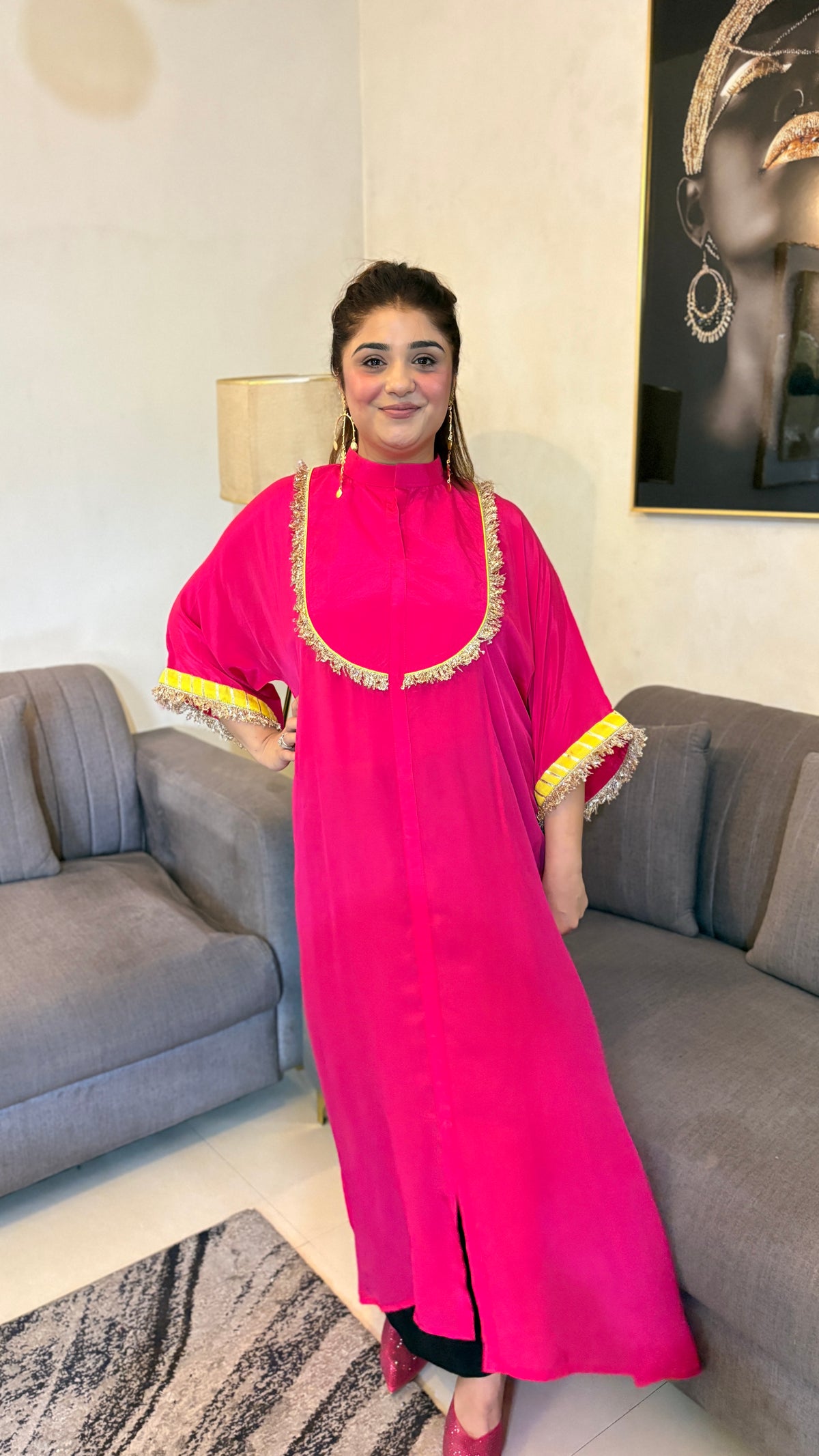 Pure crepe fushia color long kaftan style kurti with gota on the neckline nd the sleeves